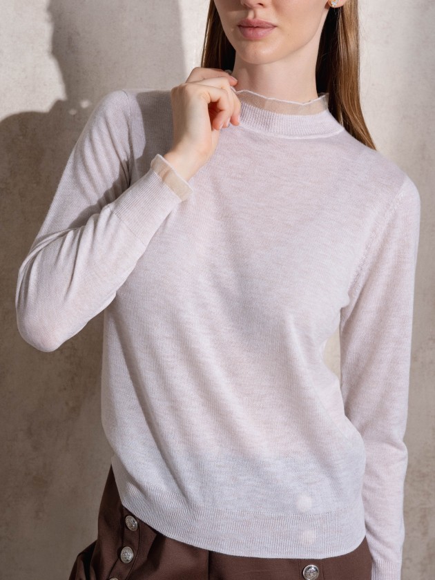 Knitted sweater with ruffles