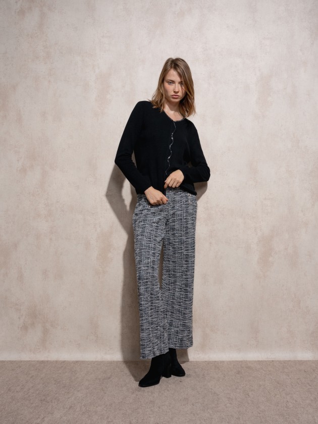 Knitted sweater with sparkles