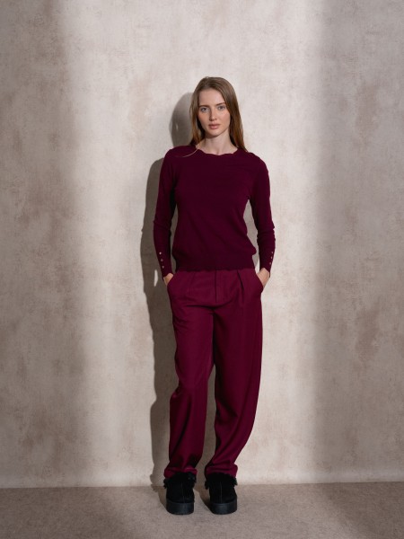 Knitted sweater with round neckline and gold buttons