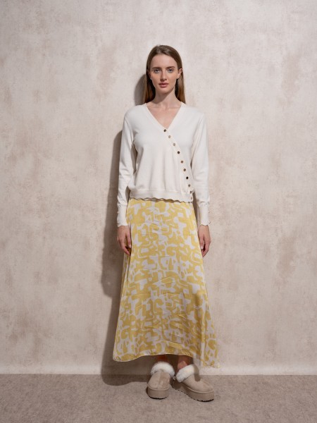 Cache coeur in knit with gold buttons