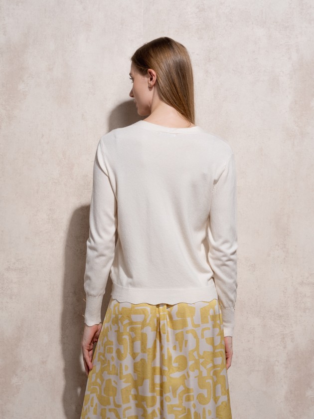 Cache coeur in knit with gold buttons