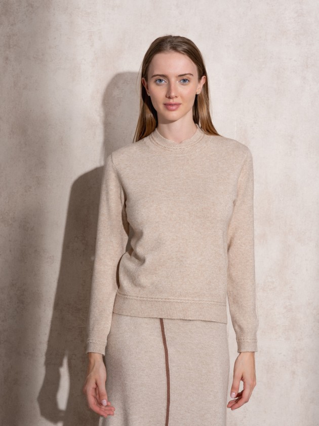 Knitted sweater with round neckline