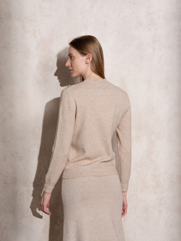 Knitted sweater with round neckline