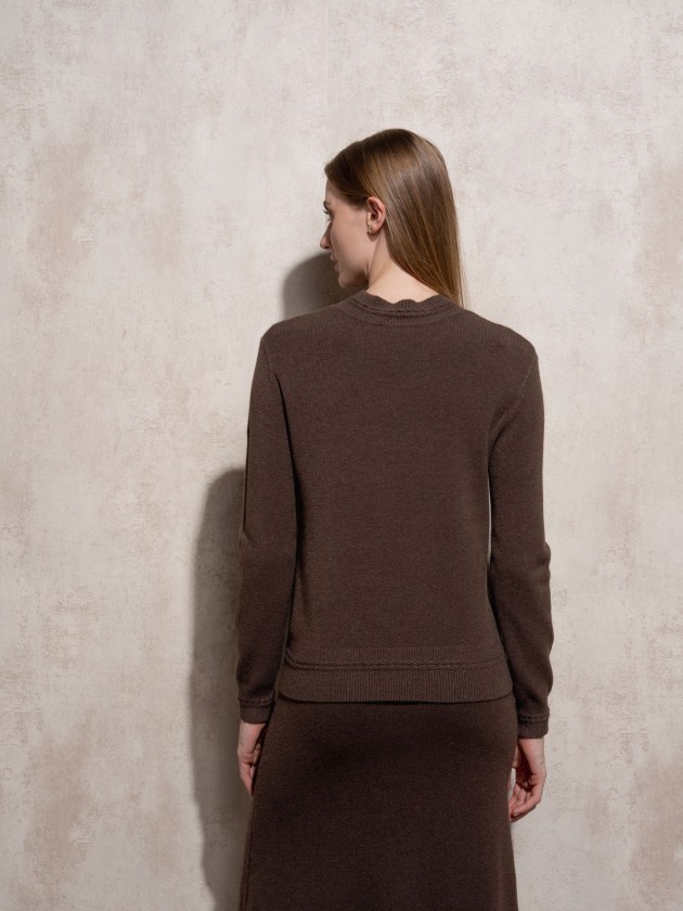 Knitted sweater with round neckline