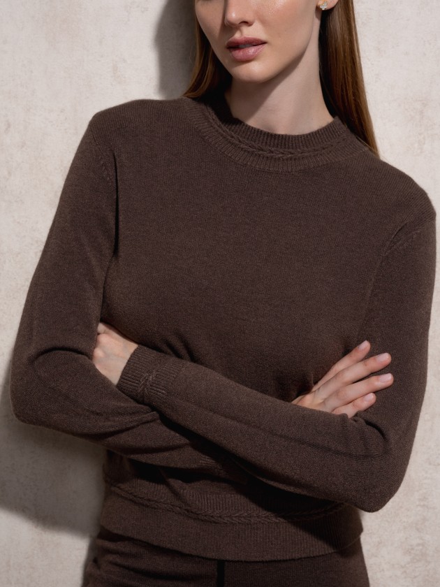 Knitted sweater with round neckline