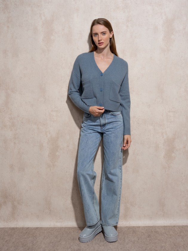 Short knitted coat with front pockets