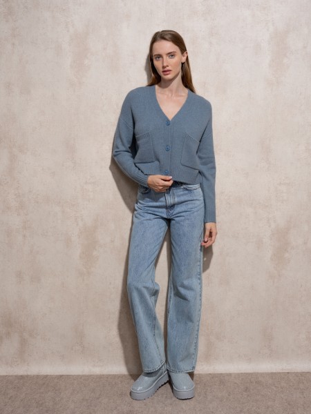 Manteau court en tricot avec poches devant