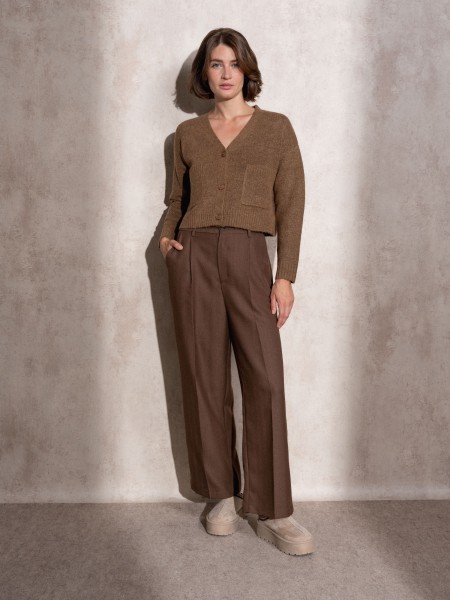 Short knitted coat with front pockets