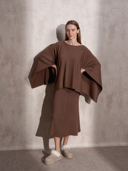 Knitted cape with round neckline