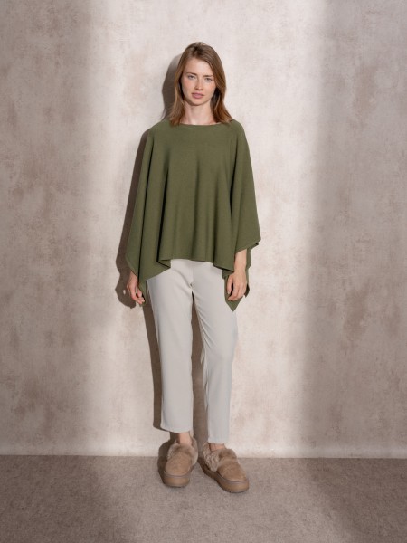 Knitted cape with round neckline