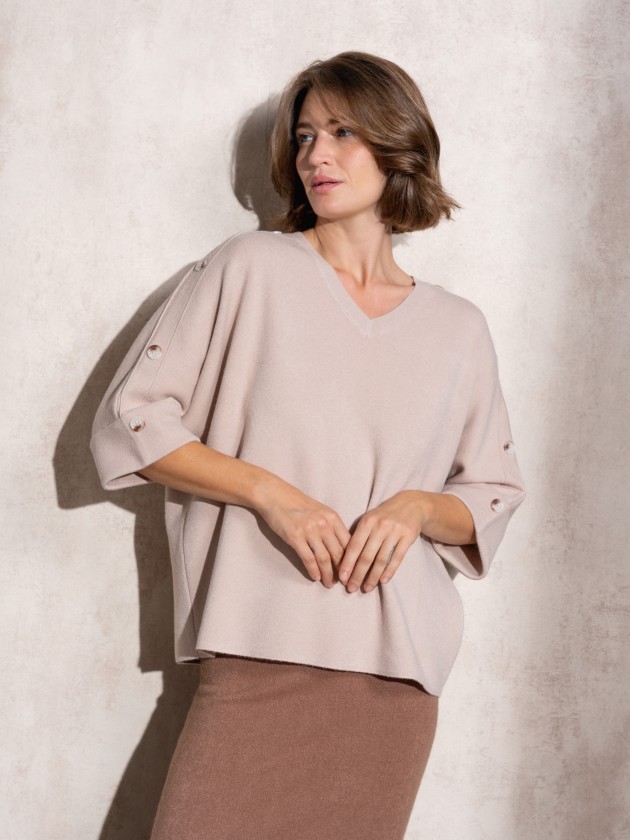Camisola de malha com botes na manga
