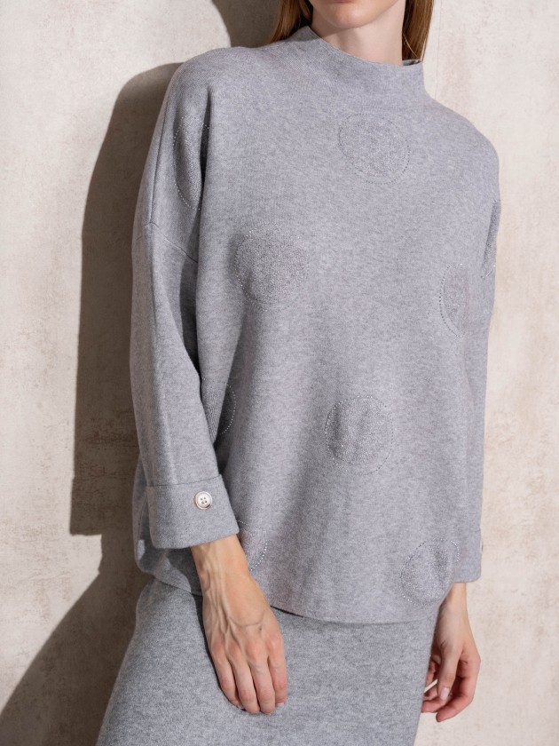 Camisola de malha com botes no punho