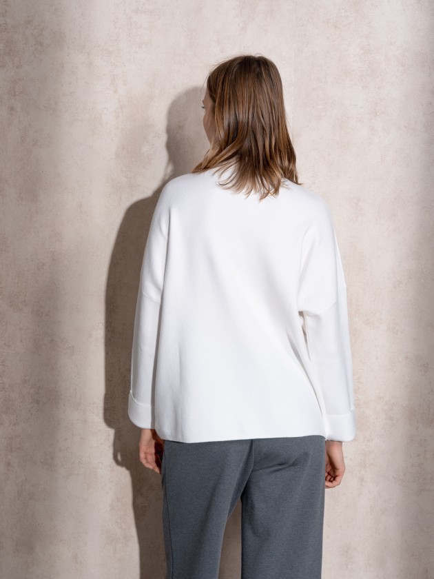 Camisola de malha com botes no punho