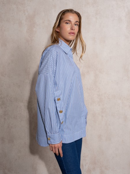 Blouse with gold buttons