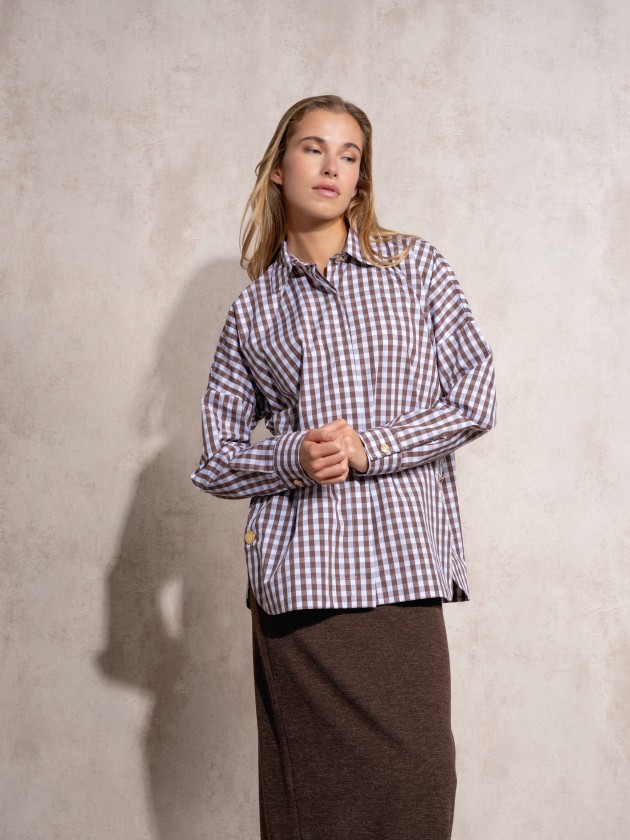 Blouse with gold buttons