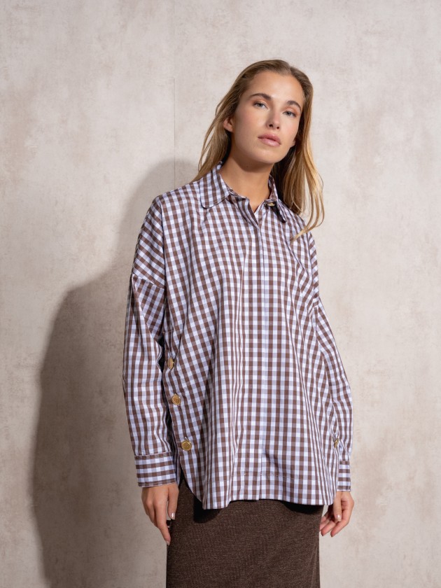 Blouse with gold buttons