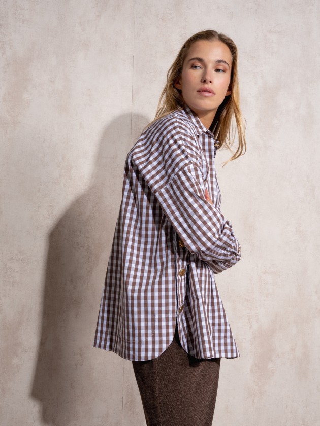 Blouse with gold buttons