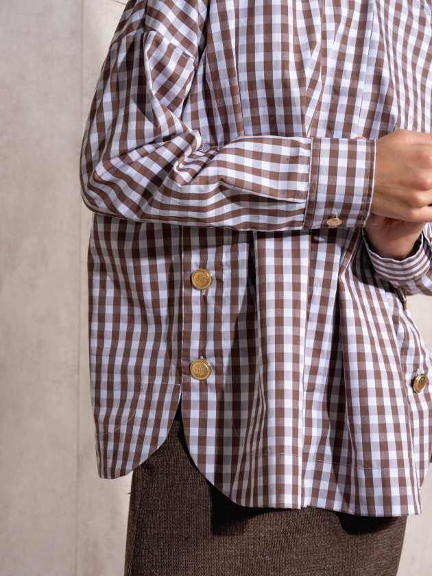 Blouse with gold buttons