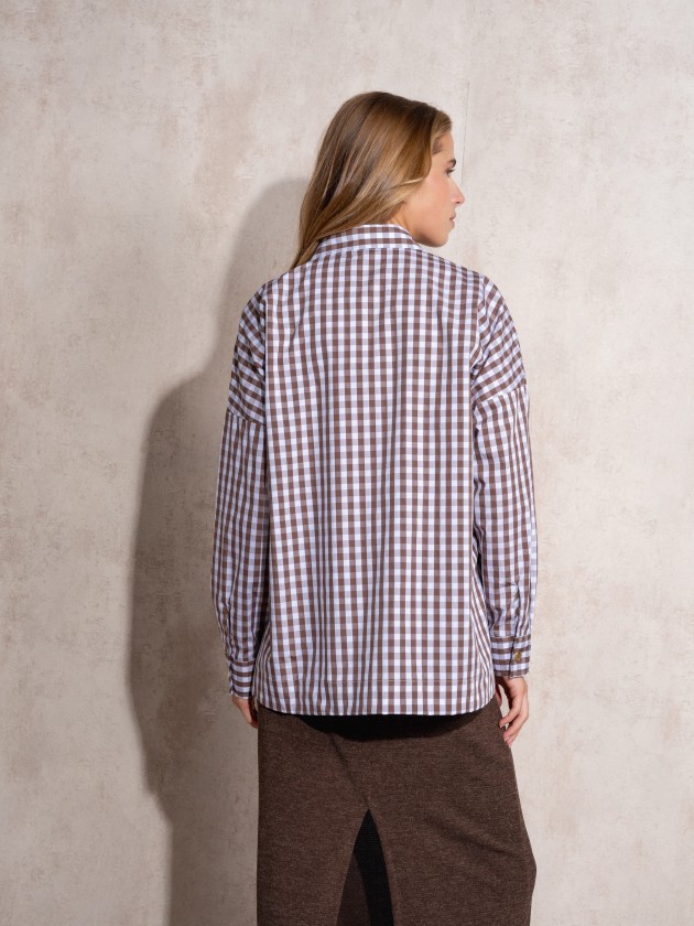 Blouse with gold buttons