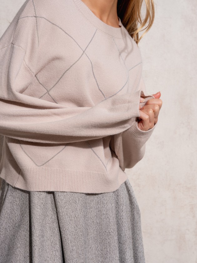 Knitted sweater with sparkles