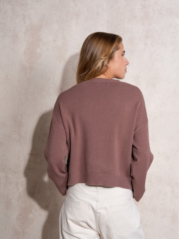 Knitted sweater with sparkles