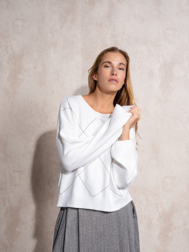 Knitted sweater with sparkles