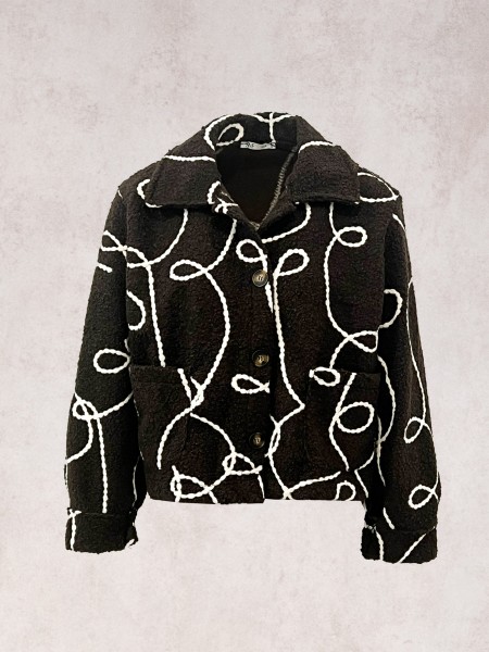 Manteau effet fourrure boucle