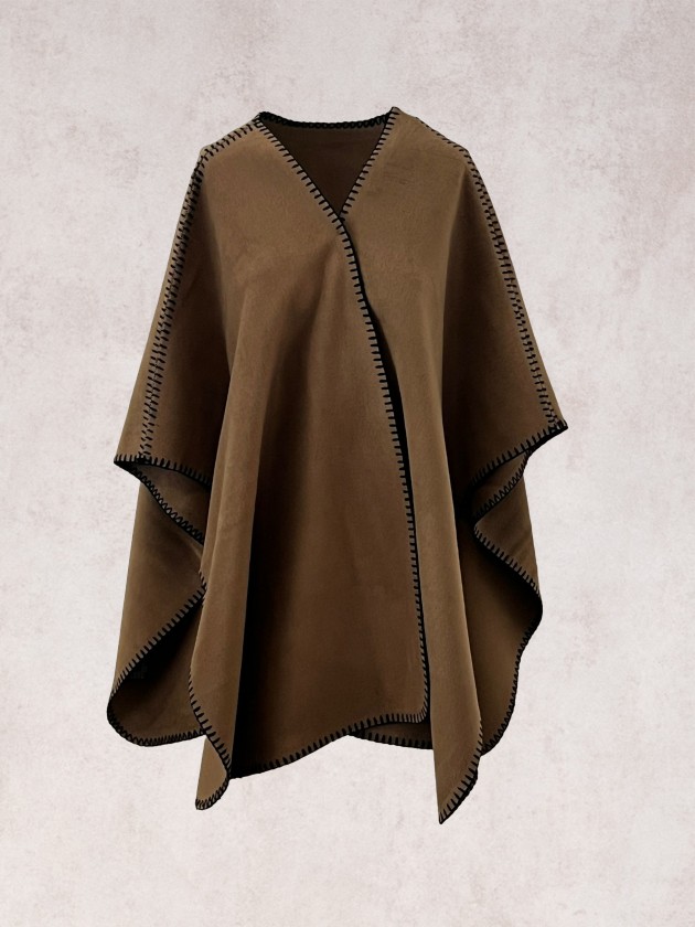 Knitted poncho with stitching detail