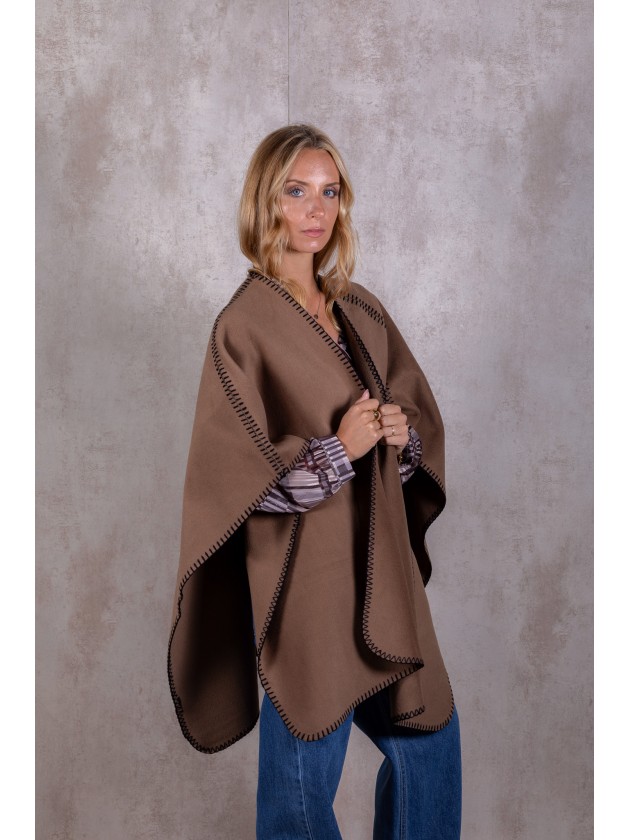 Knitted poncho with stitching detail
