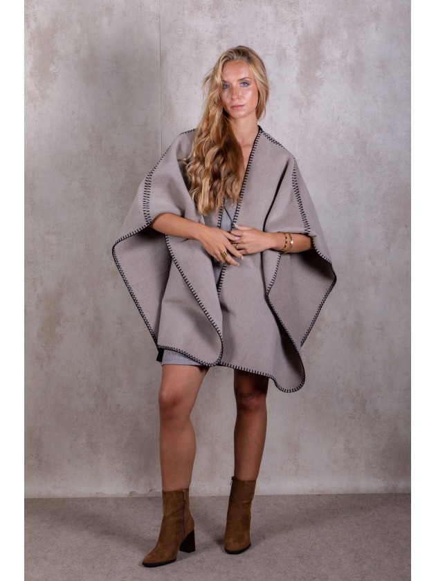 Knitted poncho with stitching detail