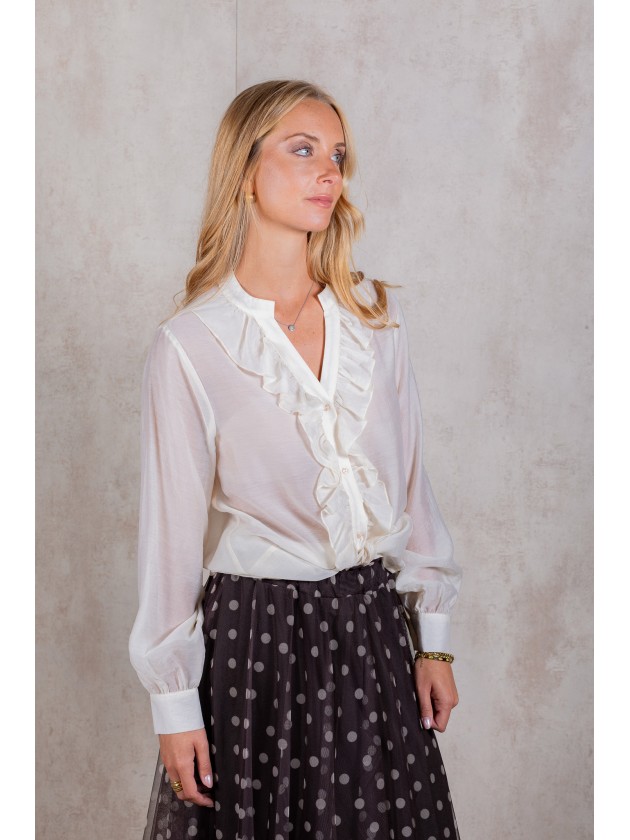 Blouse avec volants sur le devant