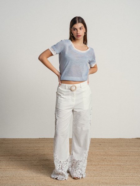 Trousers with embellishments