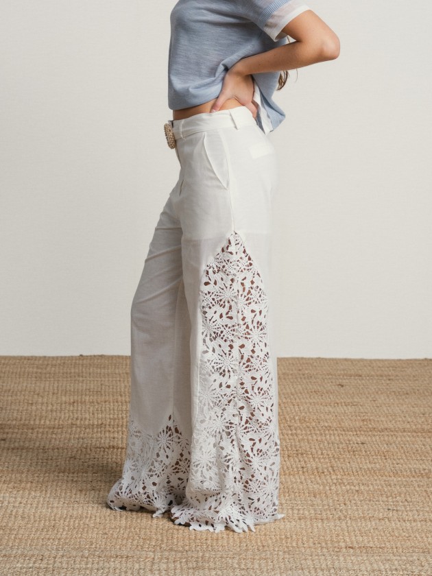 Trousers with embellishments