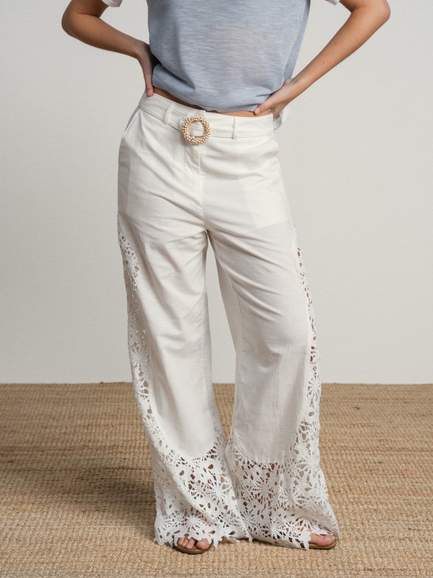 Trousers with embellishments