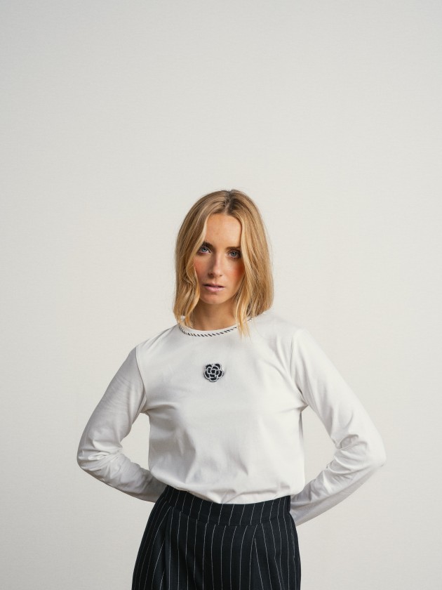 Sweater with embroidery and application Sweater with embroidery and application