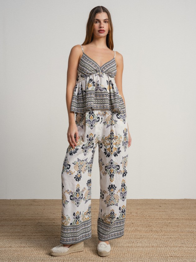 Thin strap top with print. Thin strap top with print.