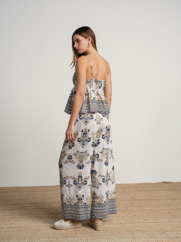 Thin strap top with print. Thin strap top with print.