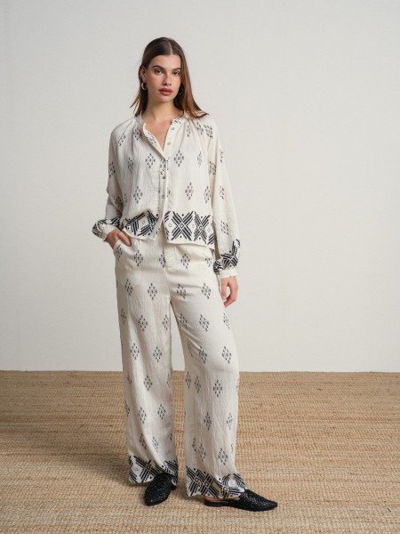 Wide, flowing pants with a print.