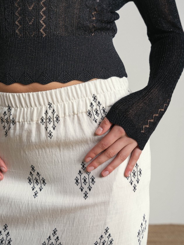 Long printed skirt with side slit.