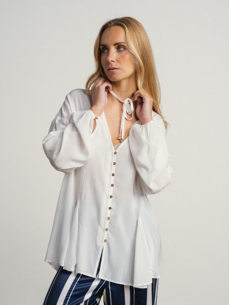 Shirt with a v-neck and drawstring waist.