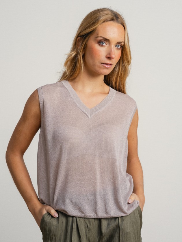 Sleeveless v-neck camisole with sheer details. Sleeveless v-neck camisole with sheer details.