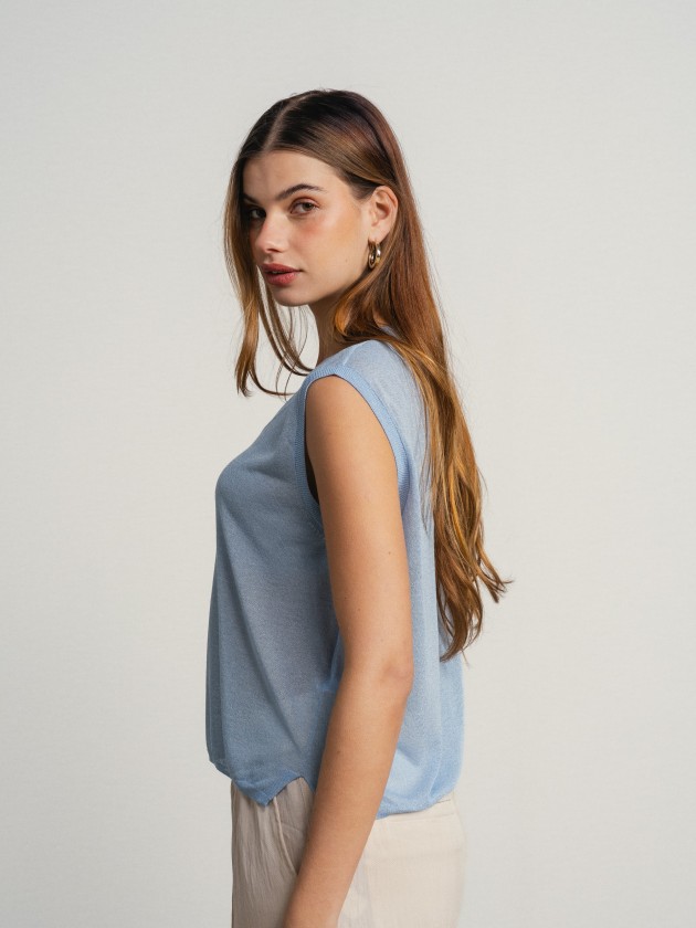 Sleeveless v-neck camisole with sheer details. Sleeveless v-neck camisole with sheer details.