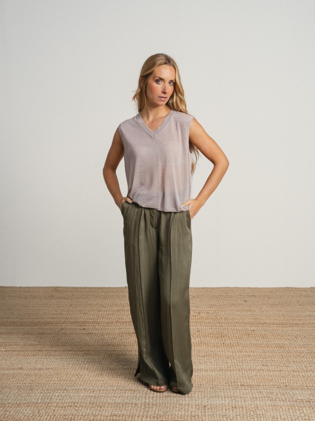 Sleeveless v-neck camisole with sheer details. Sleeveless v-neck camisole with sheer details.