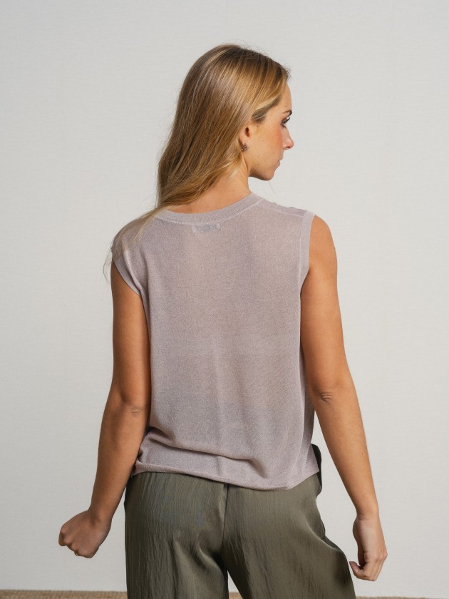Sleeveless v-neck camisole with sheer details. Sleeveless v-neck camisole with sheer details.