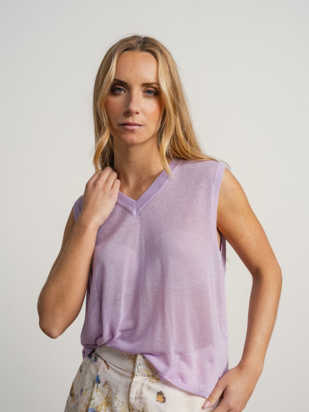 Sleeveless v-neck camisole with sheer details. Sleeveless v-neck camisole with sheer details.
