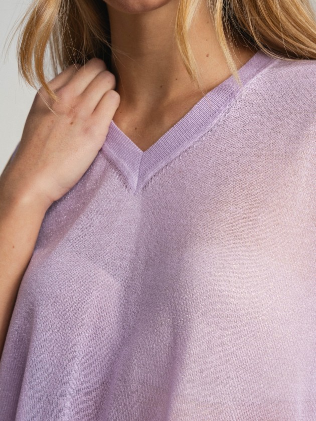 Sleeveless v-neck camisole with sheer details. Sleeveless v-neck camisole with sheer details.