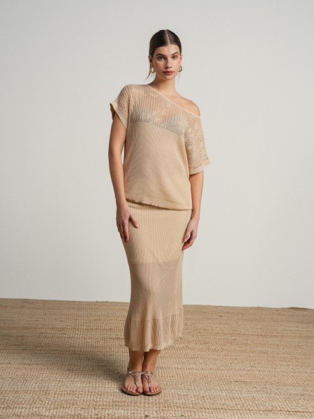 Long skirt in fine knit fabric with sheer details.