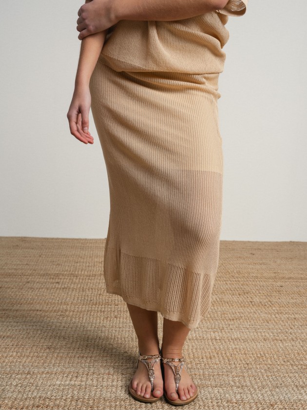 Long skirt in fine knit fabric with sheer details.