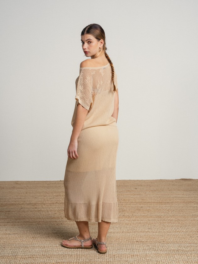 Long skirt in fine knit fabric with sheer details.