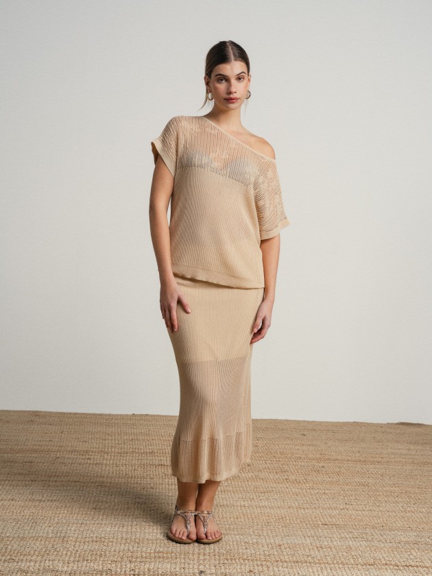 Long skirt in fine knit fabric with sheer details.